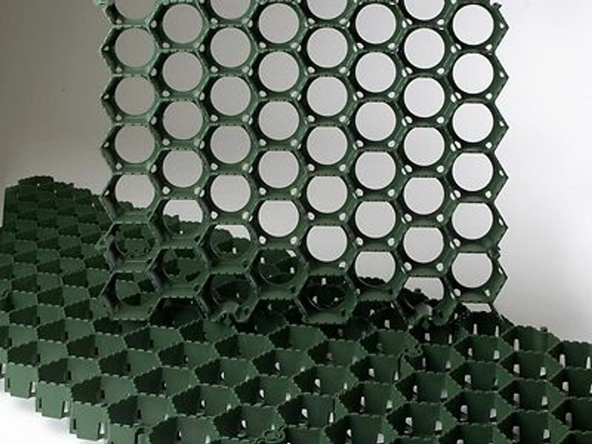 StableGRASS interlocking plastic grid panels installed on a lawn used for overflow car parking at a UK venue